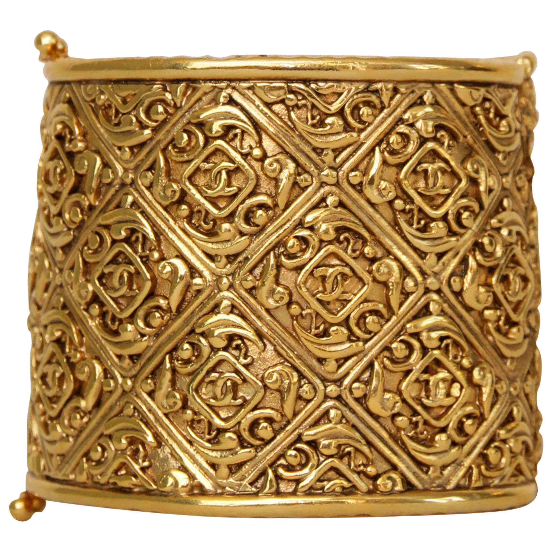 An Engraved 1980s Gold-toned Chanel Cuff Bracelet