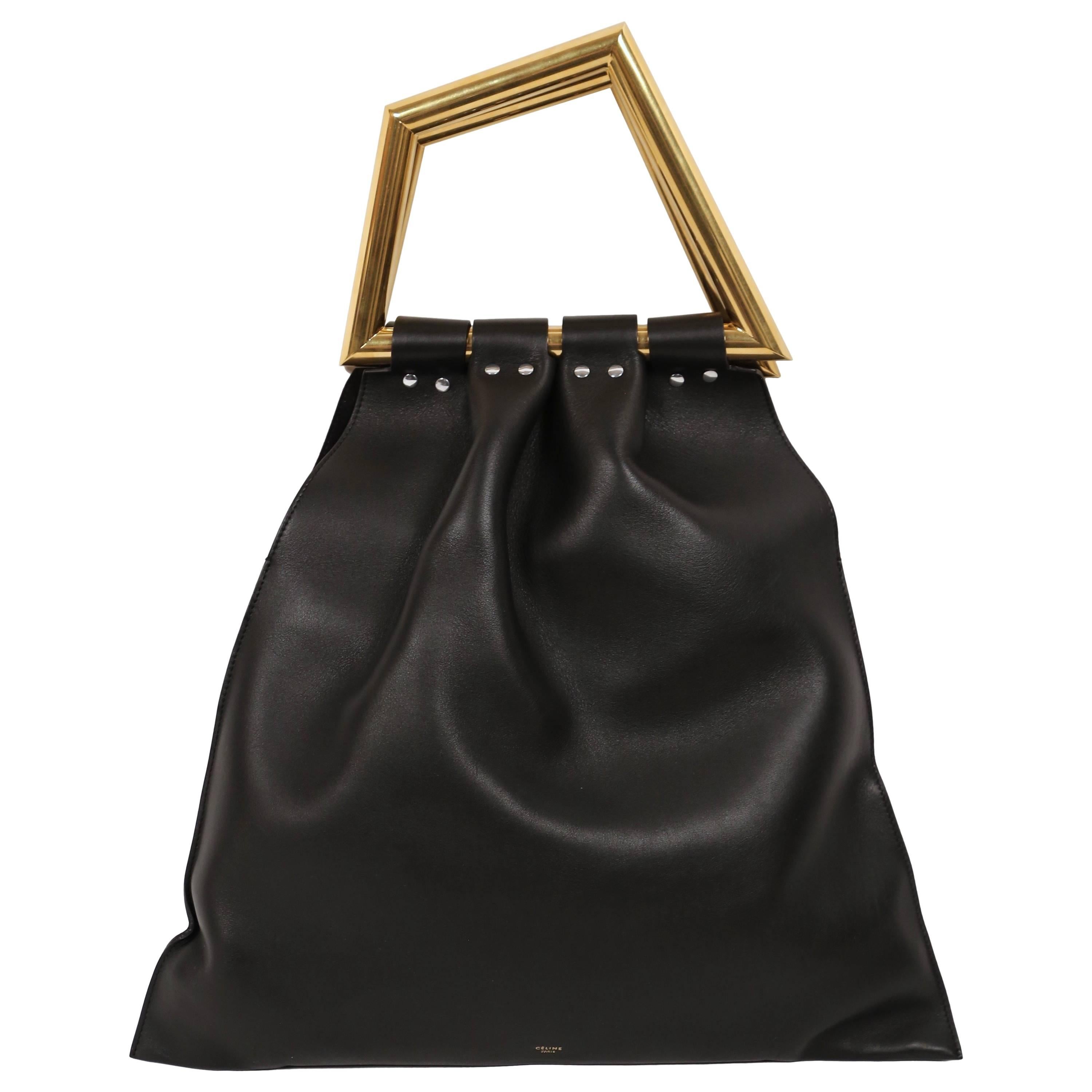 new CELINE Phoebe Philo black leather runway bag with triangular metal handle