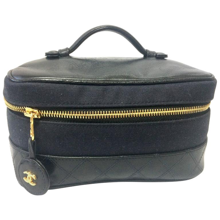 Vintage CHANEL black leather and canvas fabric vanity bag