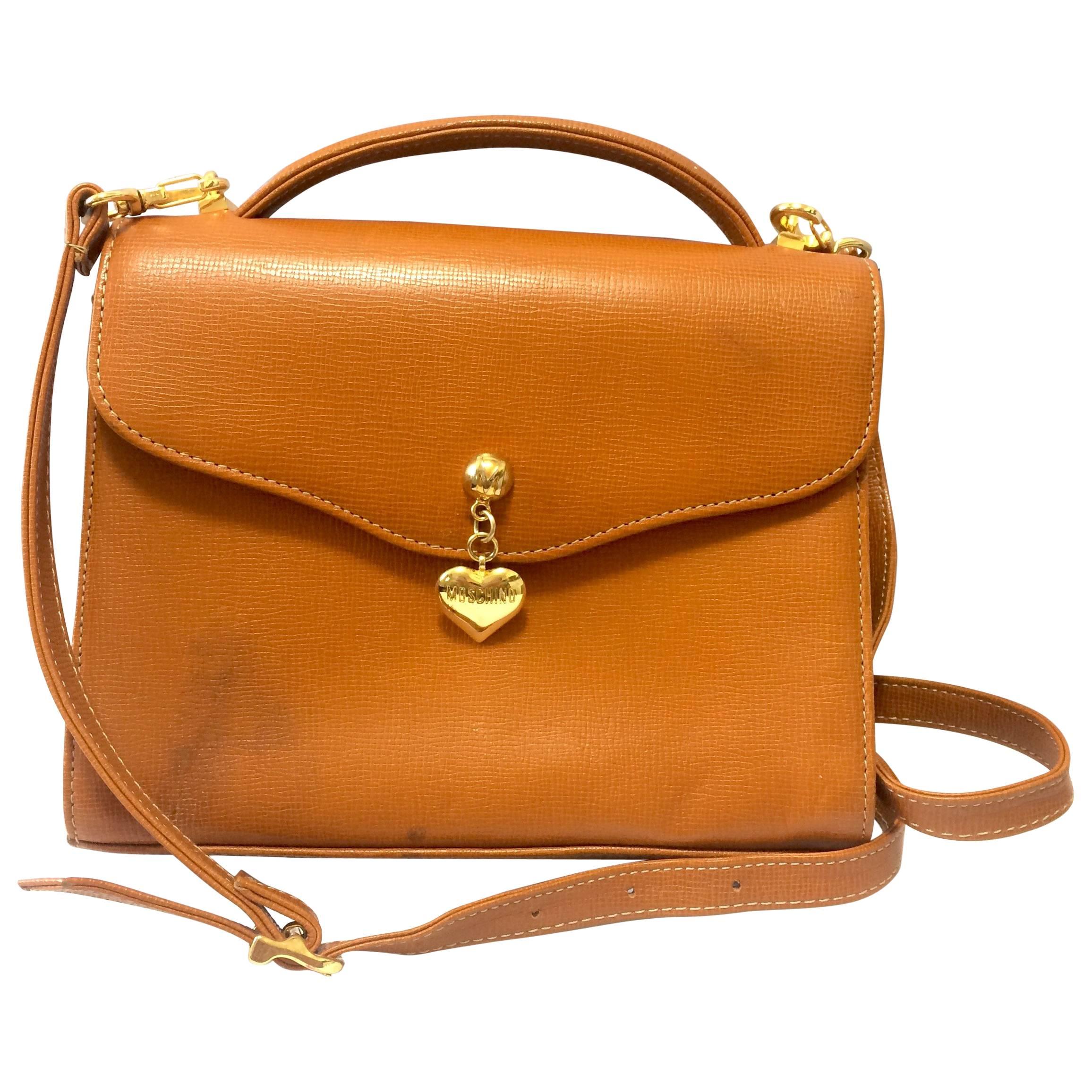 Vintage MOSCHINO orange brown grained leather kelly shoulder bag with heart moti For Sale