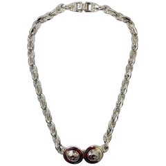 Collar Gianni Versace de plata con doble cabeza de medusa y brillantes, años 90