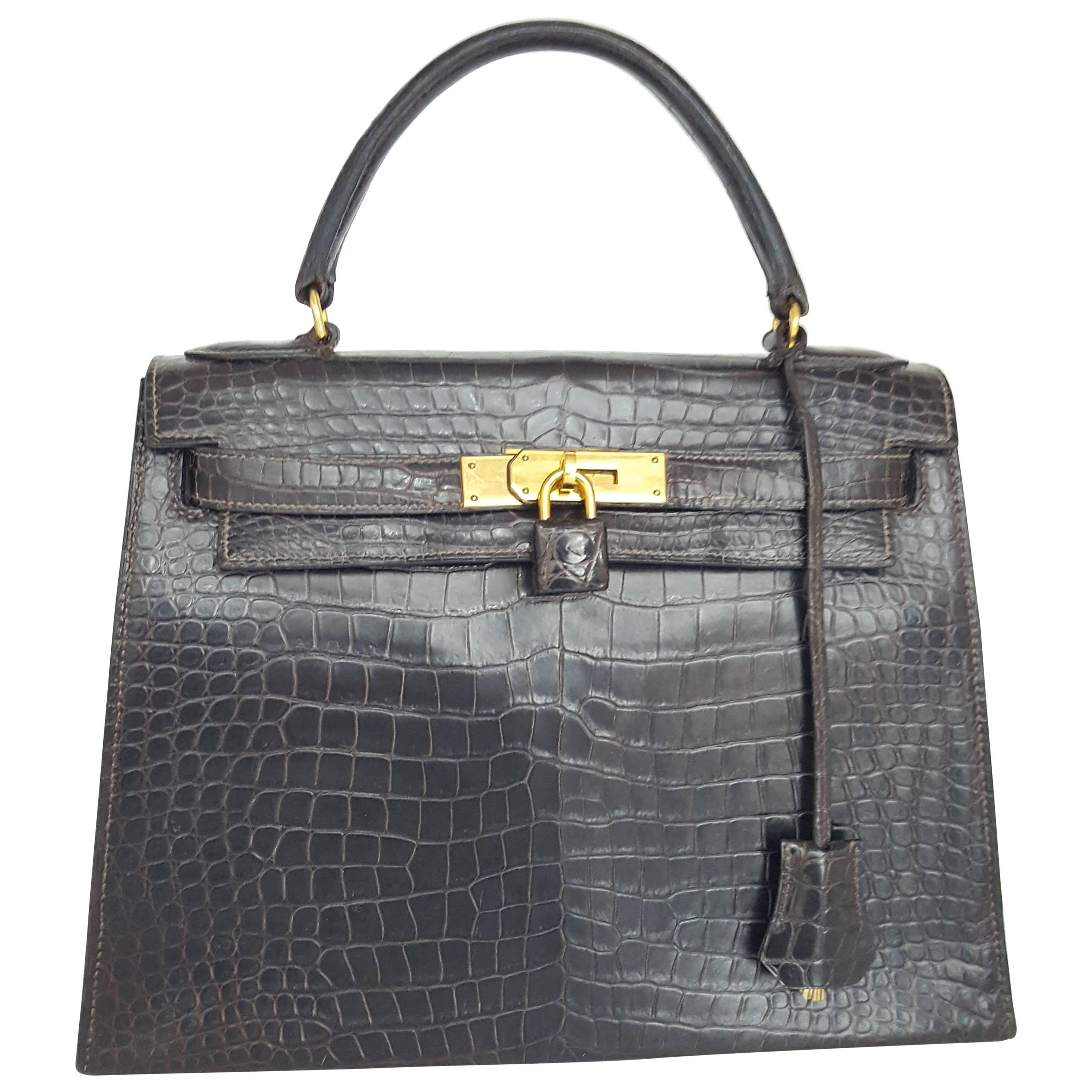 Hermes Dark Brown Shiny Crocodile Kelly 28 cm With Gold Hardware  For Sale