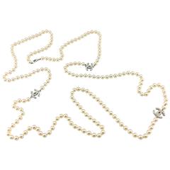2008 Chanel Long Pearl Sautoir Necklace with 3 Inset Pearl 
CC
 Logos