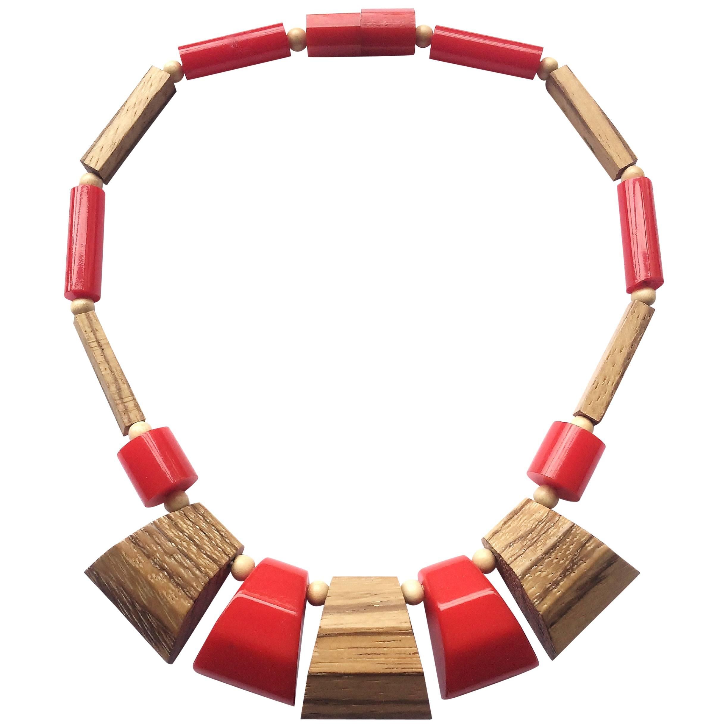A stylish red Bakelite and wood necklace, USA,  1940s