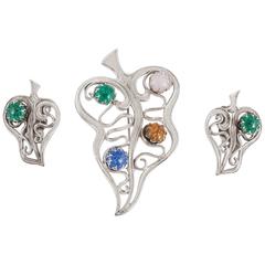 Schiaparelli Rhodium plated and art glass brooch and earring set, 1950s 2