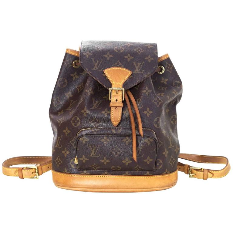 LOUIS VUITTON Blue Monogram Coated Canvas and Taiga Leather Discovery  Backpack PM at 1stDibs