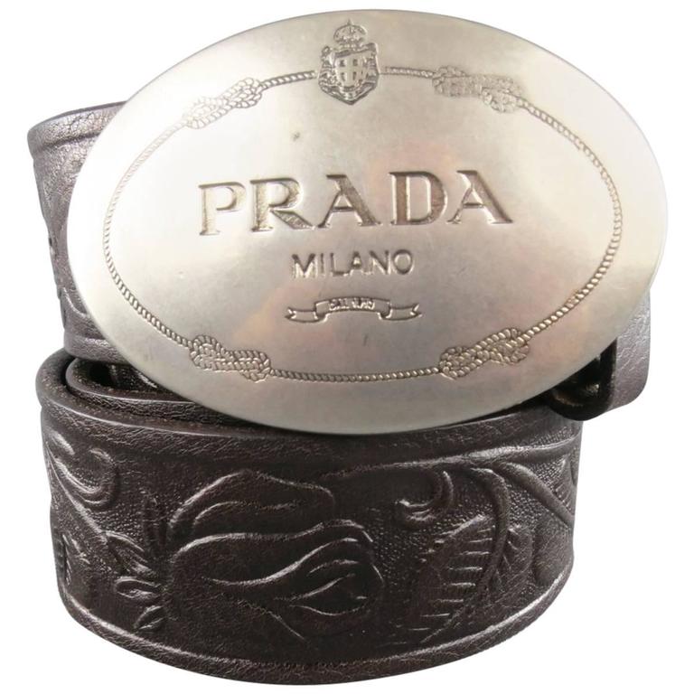 PRADA Size 40 Brown FLoral Embossed Leather Silver Logo Buckle Belt at  1stDibs | silver prada belt, prada silver belt, prada belt silver buckle