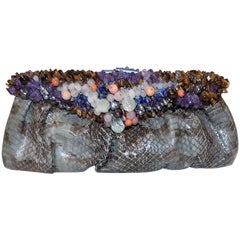 Handmade python bag/ clutch  with clustered frame of semi precious stones