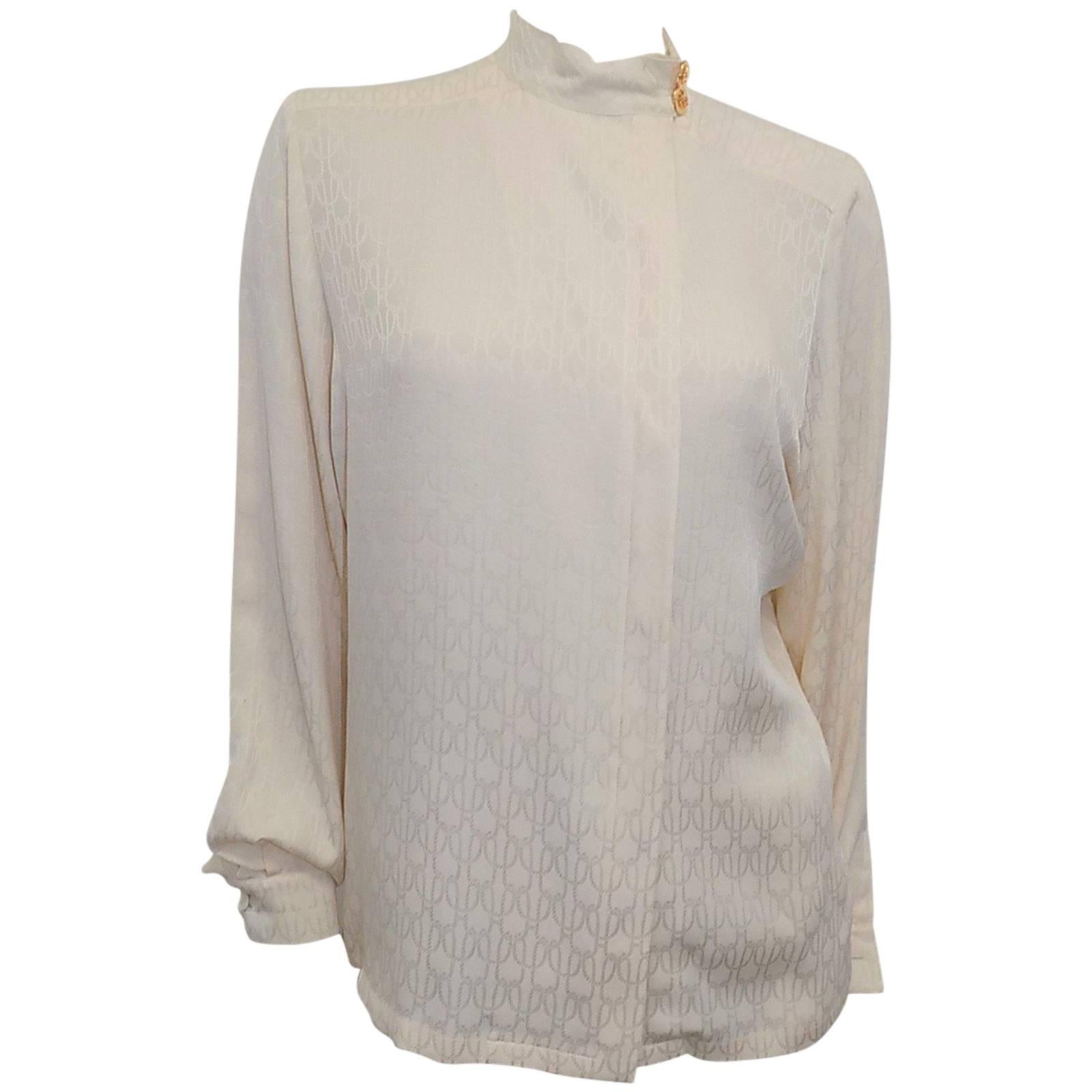 Hermes Stunning Jacquard silk print creme blouse w gold buttons For Sale