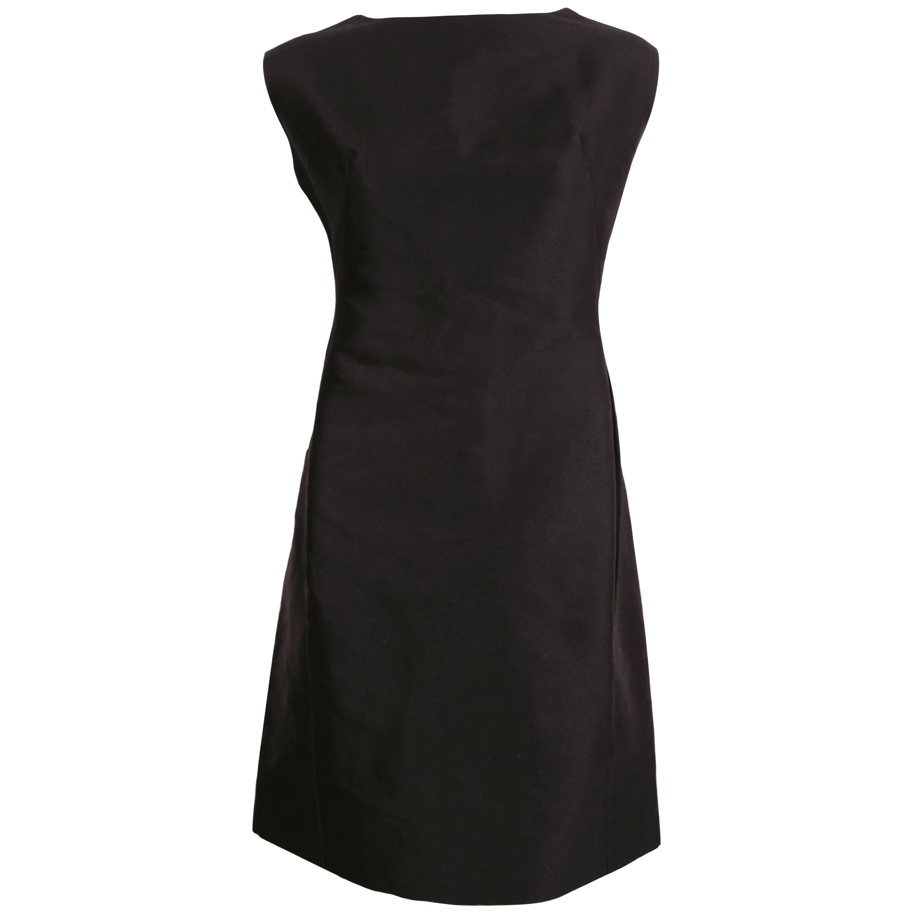 1960's TEAL TRAINA classic black wool shift dress with pockets at 1stDibs