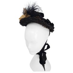 Bonnet noir victorien avec feuillage