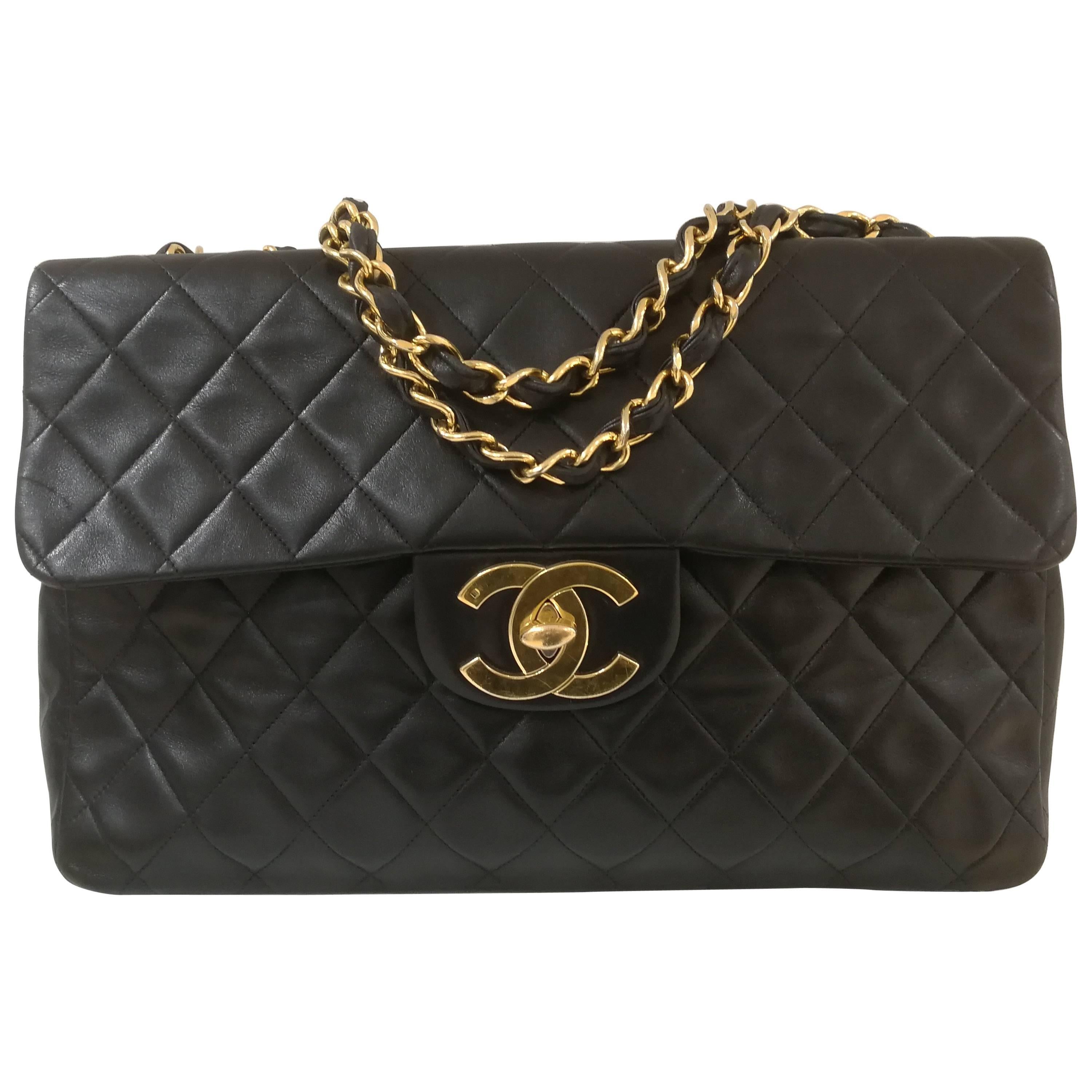 Chanel Black leather gold hardware maxi jumbo shoulder bag