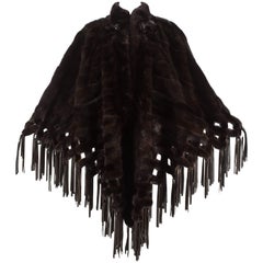 Retro Christian Dior by Marc Bohan brown mink cape with leather tassels, c. 1970