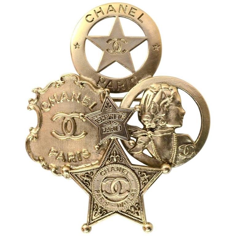 Chanel Goldtone Paris/Dallas CC Badge Brooch Pin For Sale at 1stDibs