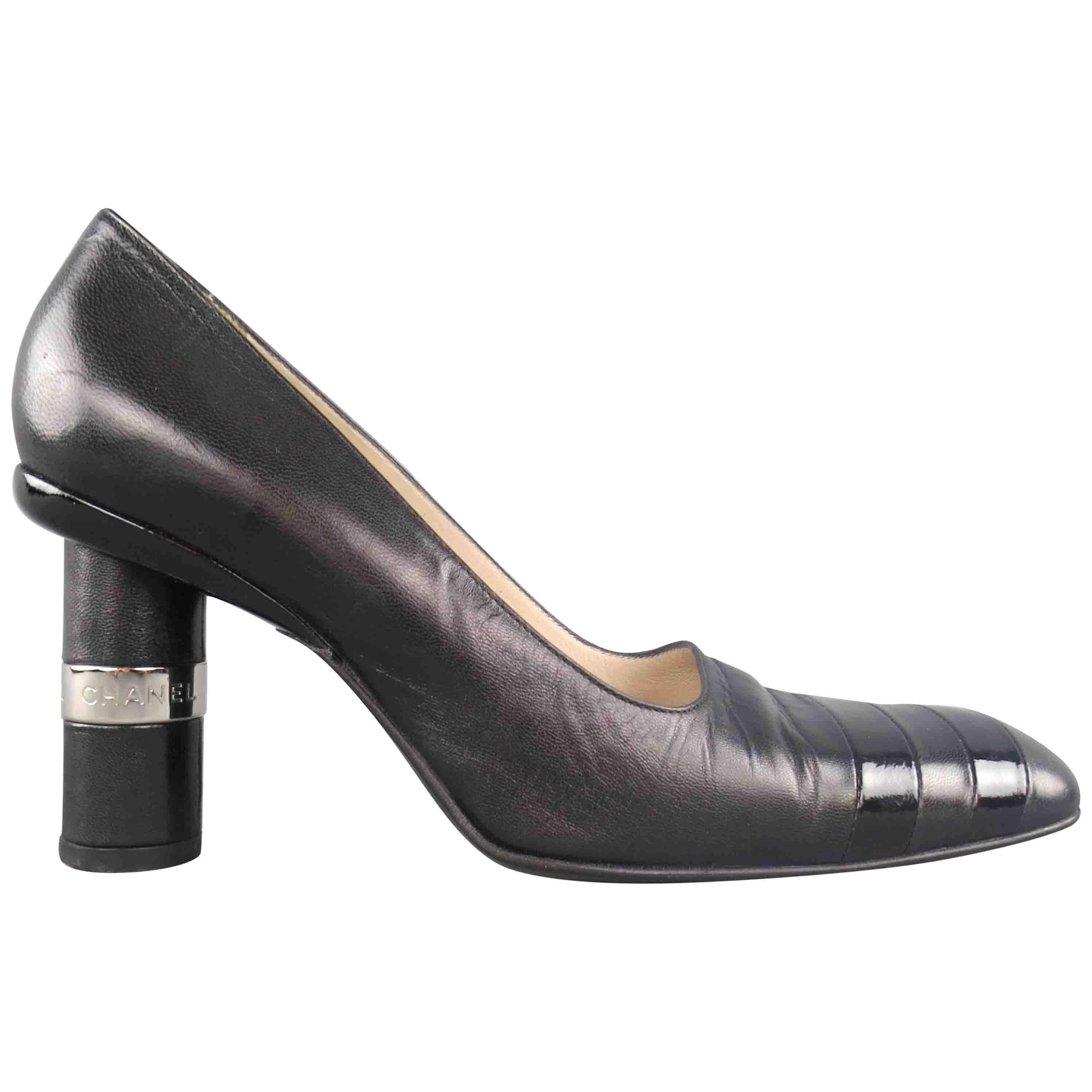 Vintage CHANEL Size 8.5 Black Leather Silver Logo Round Heel Pumps