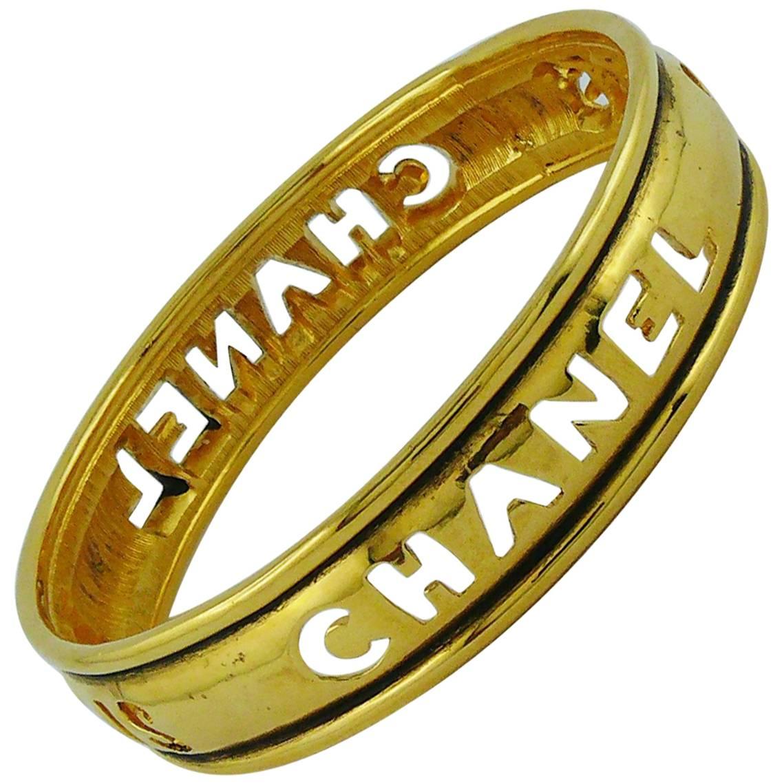Chanel Vintage 1980s Gold Toned Cut Out Bangle Bracelet  For Sale