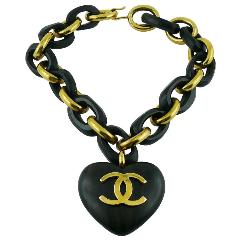 Chanel Vintage Rare Iconic Massive Wooden Heart Necklace at 1stDibs  chanel  wooden chain, black heart chanel necklace, wood heart necklace