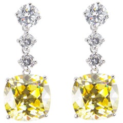 Sorprendentes pendientes de diamante amarillo de imitación