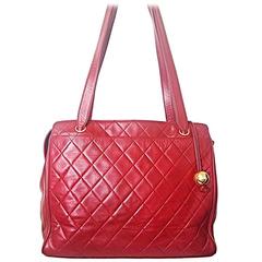 Vintage CHANEL deep red color classic quilted leather tote bag with gold ball.