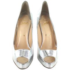 CHRISTIAN LOUBOUTIN Open toe Pumps Size 37FR in Silver Leather