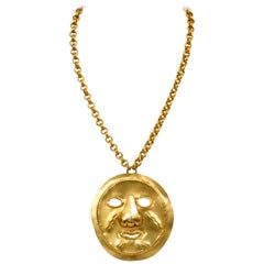 Vintage Yves Saint Laurent Pre Columbian Gold Metal Mask Pensant Necklace