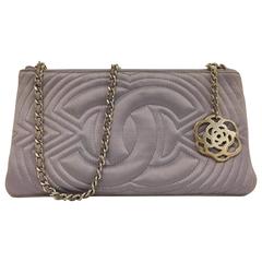 Charming Chanel Small Satin Lavender Clutch with Metal Charm 12