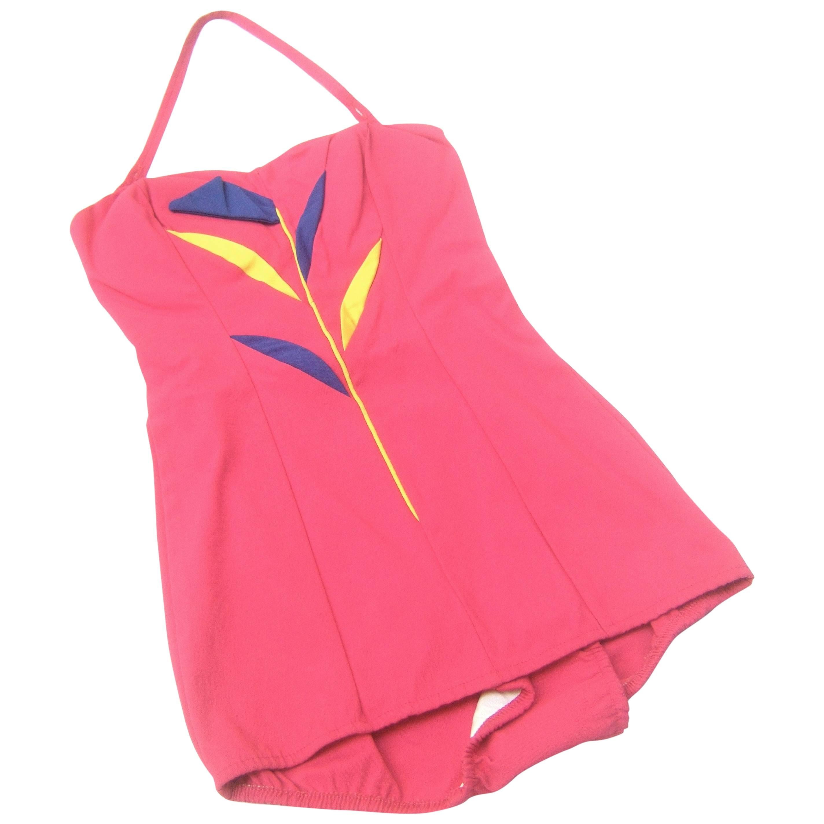 Late 1950
s Rose Pink Pin Up Style Swimsuit with Floral Applique.