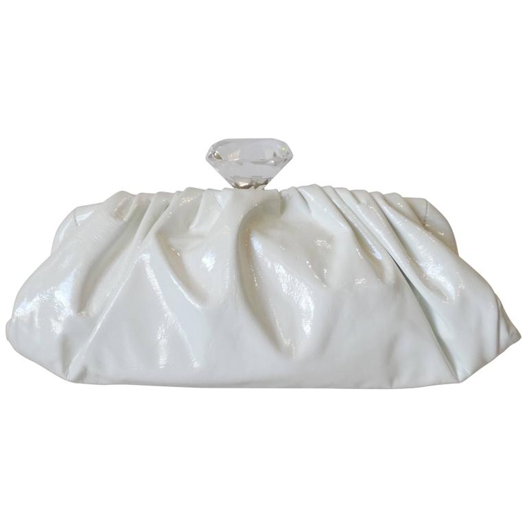 white patent leather clutch