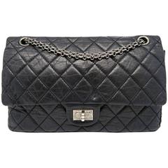 Chanel 2.55 Reissue Black Quilted Calfskin Leather Silver Metal Chain Flap Bag