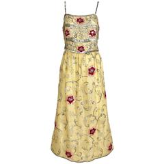 1960s yellow silk gown with red and silver sequin vintage embroidered gown 1