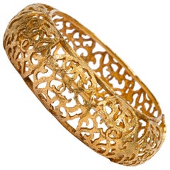 Chanel Goldtone Scroll Bangle