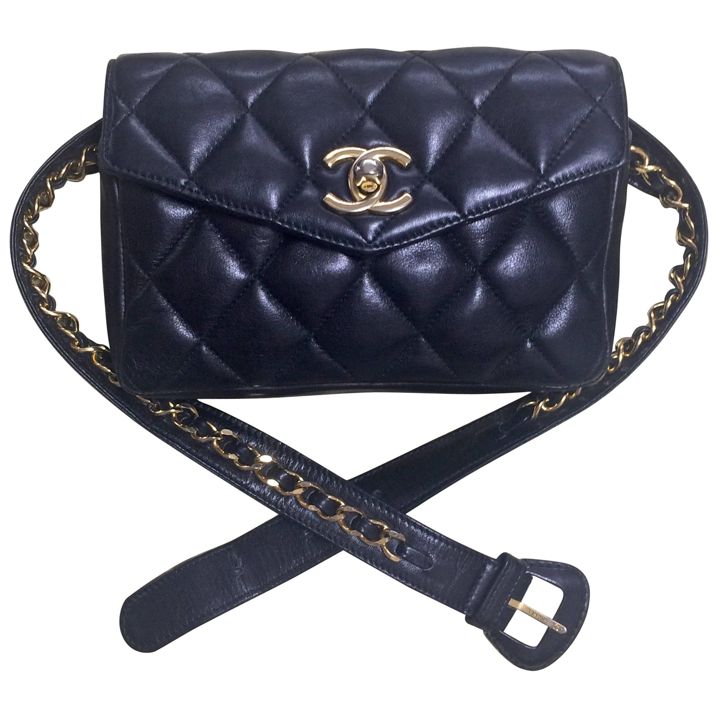 Vintage CHANEL black leather waist bag, fanny pack with golden chain belt & CC.