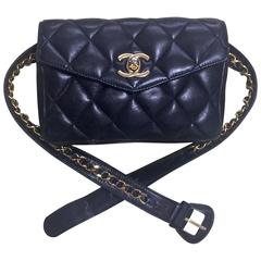 Retro CHANEL black leather waist bag, fanny pack with golden chain belt & CC.