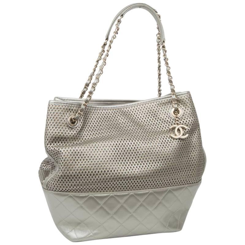 CHANEL Bag in Quilted and Perforated Silver Leather