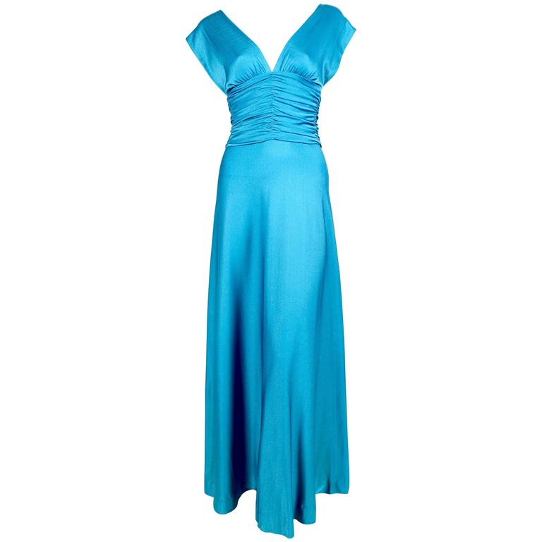 1970's LORIS AZZARO turquoise jersey dress with ruching For Sale at 1stdibs