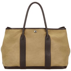 Hermes Canvas and Gold Leather Tote Bag at 1stdibs