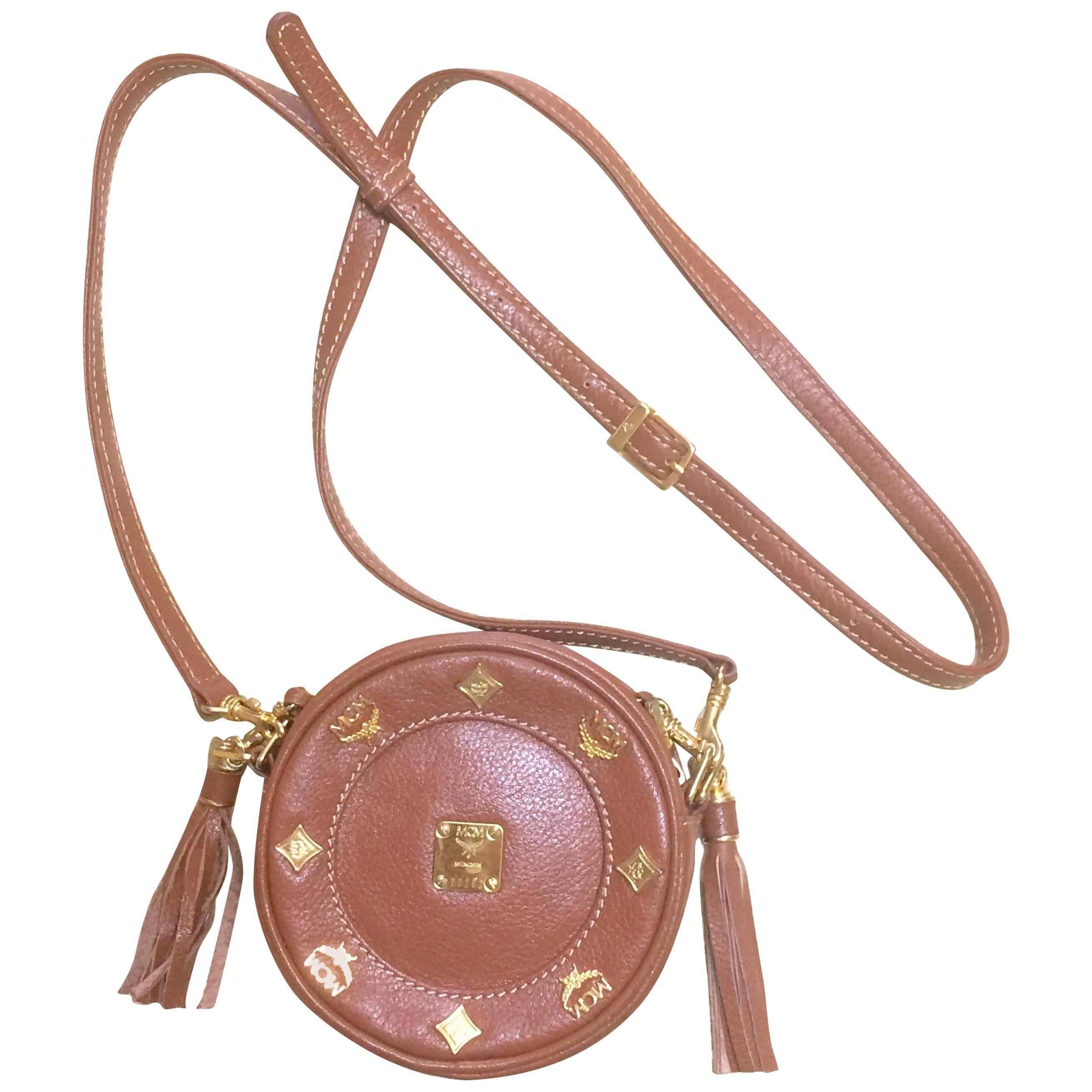 Vintage MCM brown leather round  mini Suzy Wong shoulder bag with fringes. For Sale