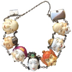 Toshikane Seven Lucky Gods Bracelet. Porcelain and Silver. 1940's.