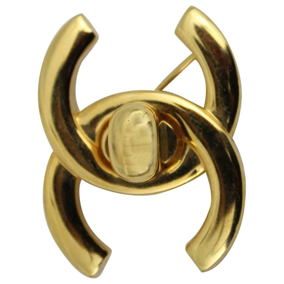1997 Gold Plated Chanel Brooche Representing the Iconic Mademoiselle Bag Clasp