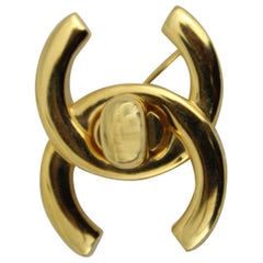 1997 Gold Plated Chanel Brooche Representing the Iconic Mademoiselle Bag Clasp