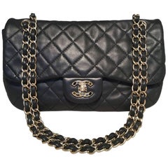RARE Chanel Quilted Black Leather Gem Logo Closure Classic Flap