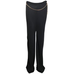 Chanel - Pantalon en jersey noir avec chaîne dorée en cuir noir