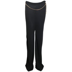 Chanel Hose aus schwarzem Jersey mit schwarzem Leder und goldener Kette