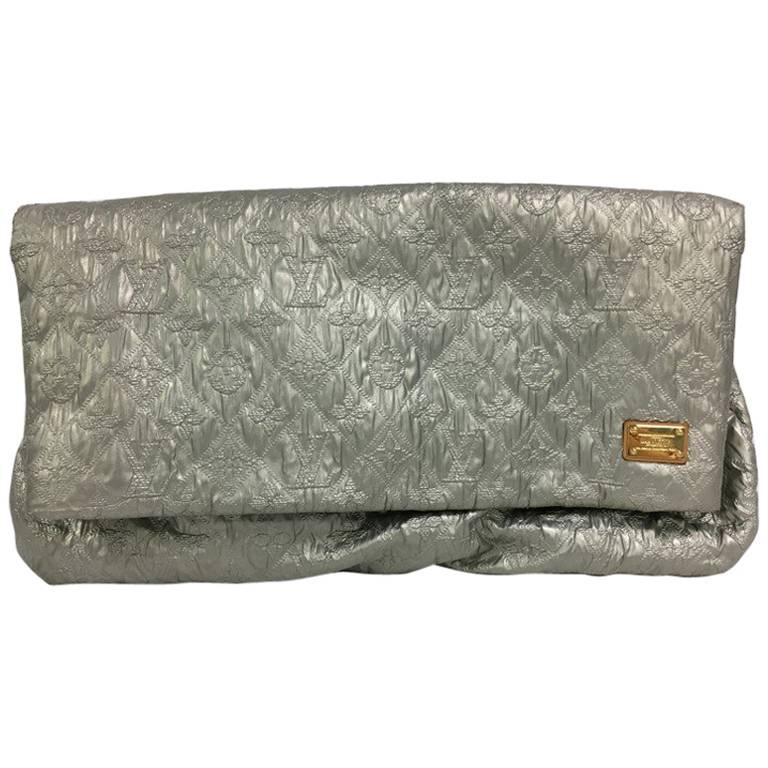 Limelight leather clutch bag Louis Vuitton Silver in Leather