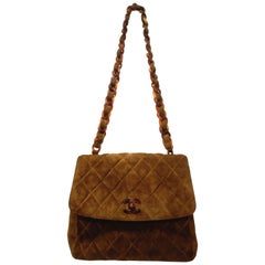 Vintage Chanel brown suede baguelite shoulder bag