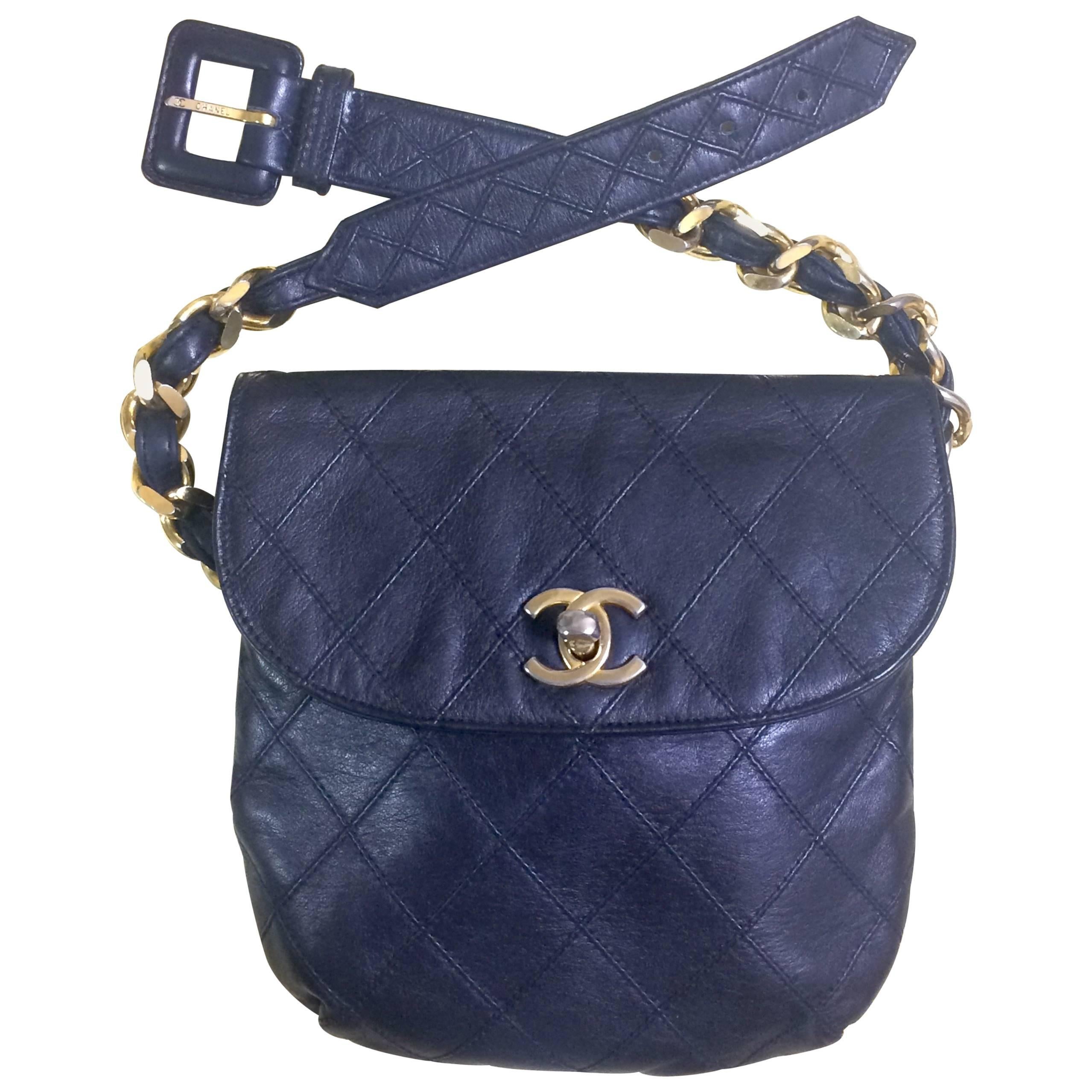 Vintage CHANEL dark navy leather waist purse, fanny pack with golden chain belt.