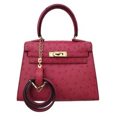 Hermès Mini Kelly Bag 20 cm Red Ostrich Gold Hdw Matching Ring Charm