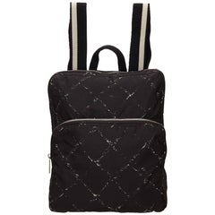 Chanel Black and White Quilted Printed Travel Line Backpack