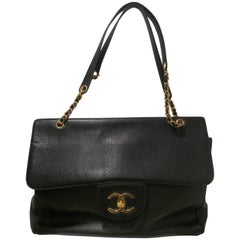 Chanel XL Black caviar Leather gold hardware shoulder bag