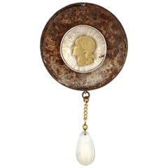Rust and Coin Head Brooch